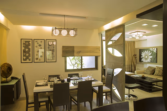 Apollo DB City – dining and living area of the furnished sample flat
