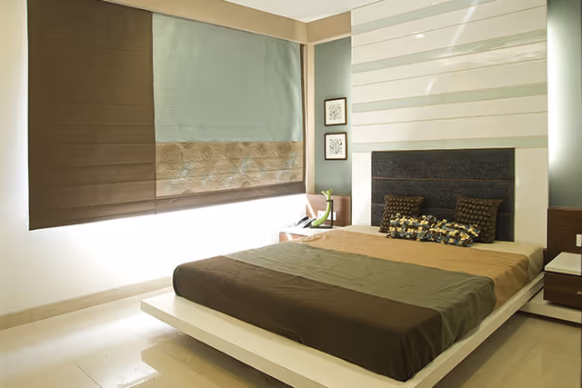 Apollo DB City – master bedroom of the sample flat