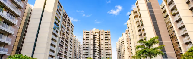 Apollo DB City – wide view of tower facades inside the township