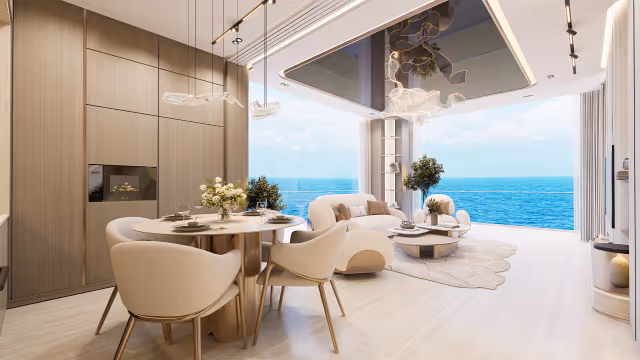 Breez by Danube – furnished living and dining room with floor-to-ceiling sea view