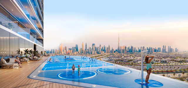 Oasiz 2 by Danube – podium infinity pool and splash pads facing the Dubai skyline