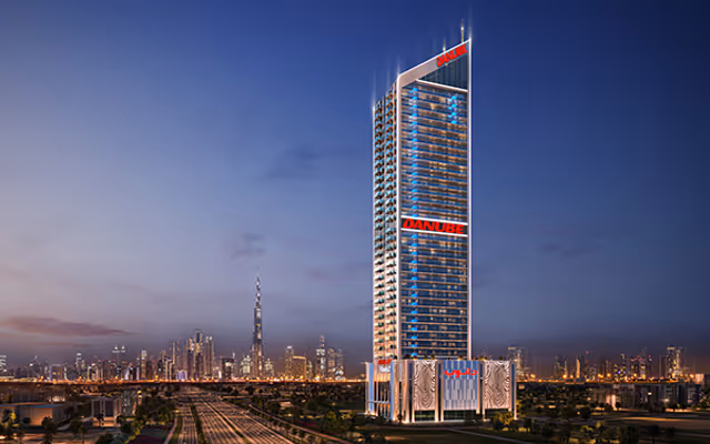 Oasiz 2 by Danube – 38-storey tower at dusk with the Burj Khalifa skyline behind