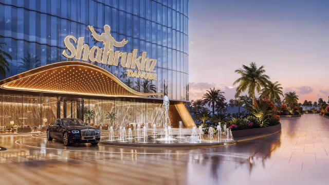 Shahrukhz by Danube – illuminated entrance canopy with fountain and valet drop-off