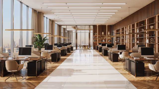 Shahrukhz by Danube – large office floor with workstations and library wall