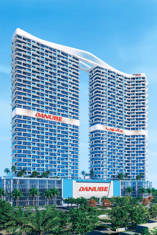 Sportz by Danube – both towers rising from the branded retail podium