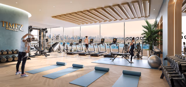 Timez by Danube – indoor gym with floor-to-ceiling skyline glazing