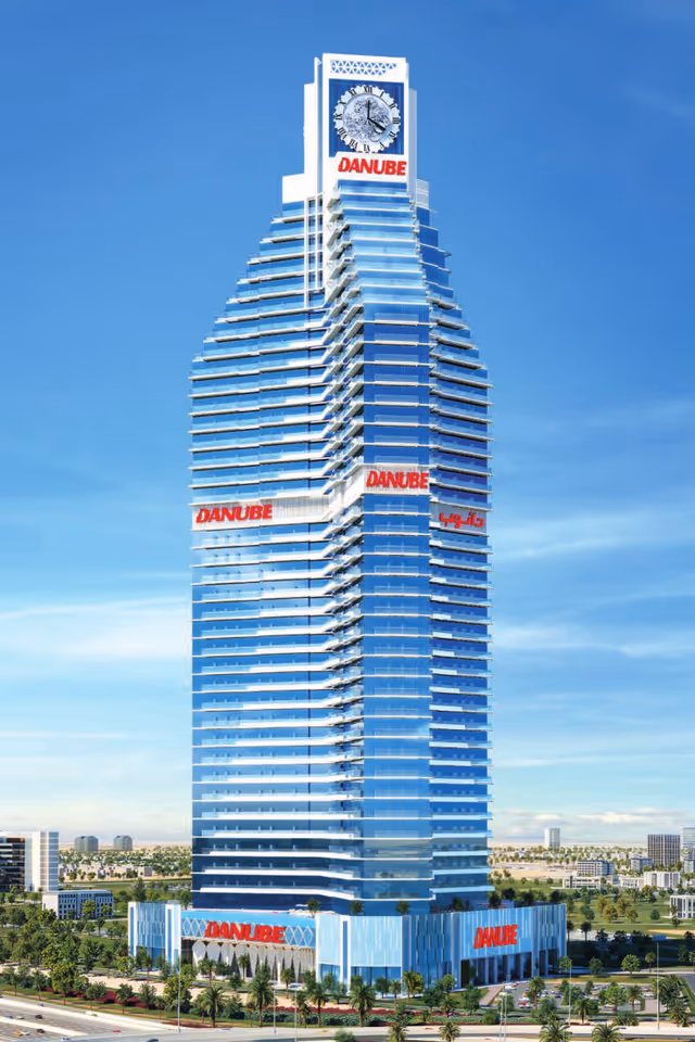 Timez by Danube – full tower elevation with clock face and podium retail