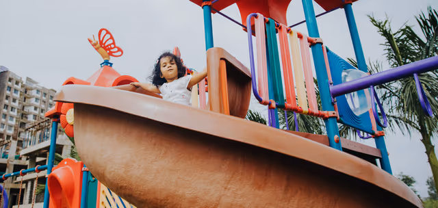DB Pride – children's play equipment in the township garden