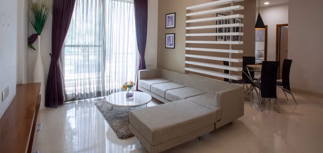 DB Pride – living and dining area of the furnished sample flat