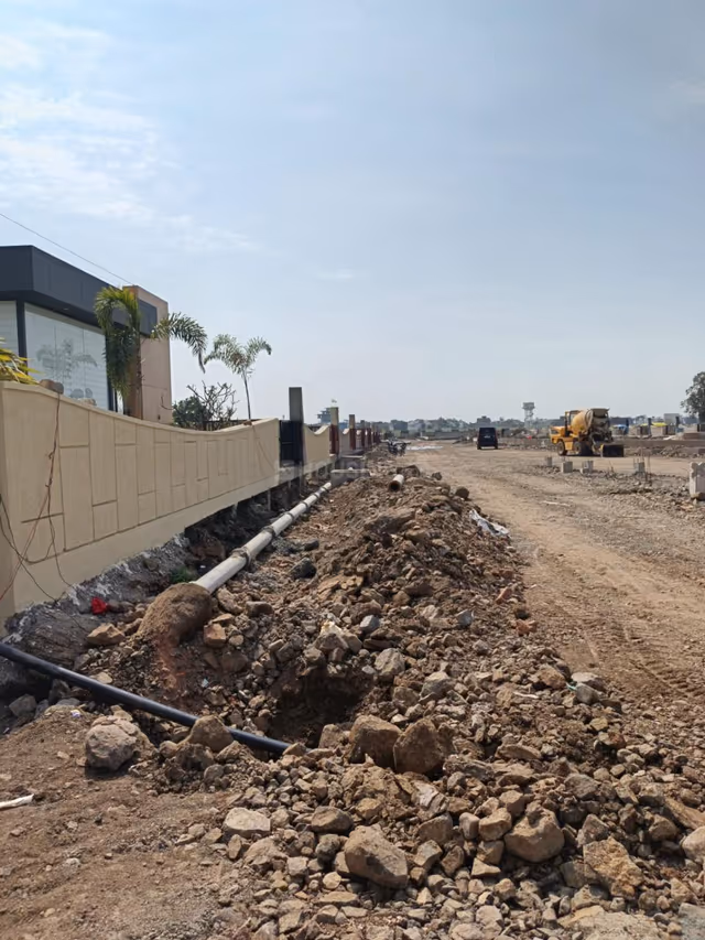 Emerald Crescent – site progress: boundary wall built and HDPE water line being laid
