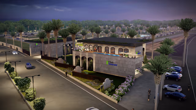 Emerald Gardenia – clubhouse and entrance block at dusk