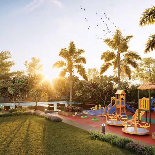 Skye Hyde Park – children's play area beside the sports court at sunset (render)
